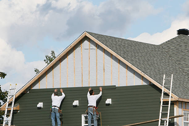 Professional Siding technician working in Madison, NC